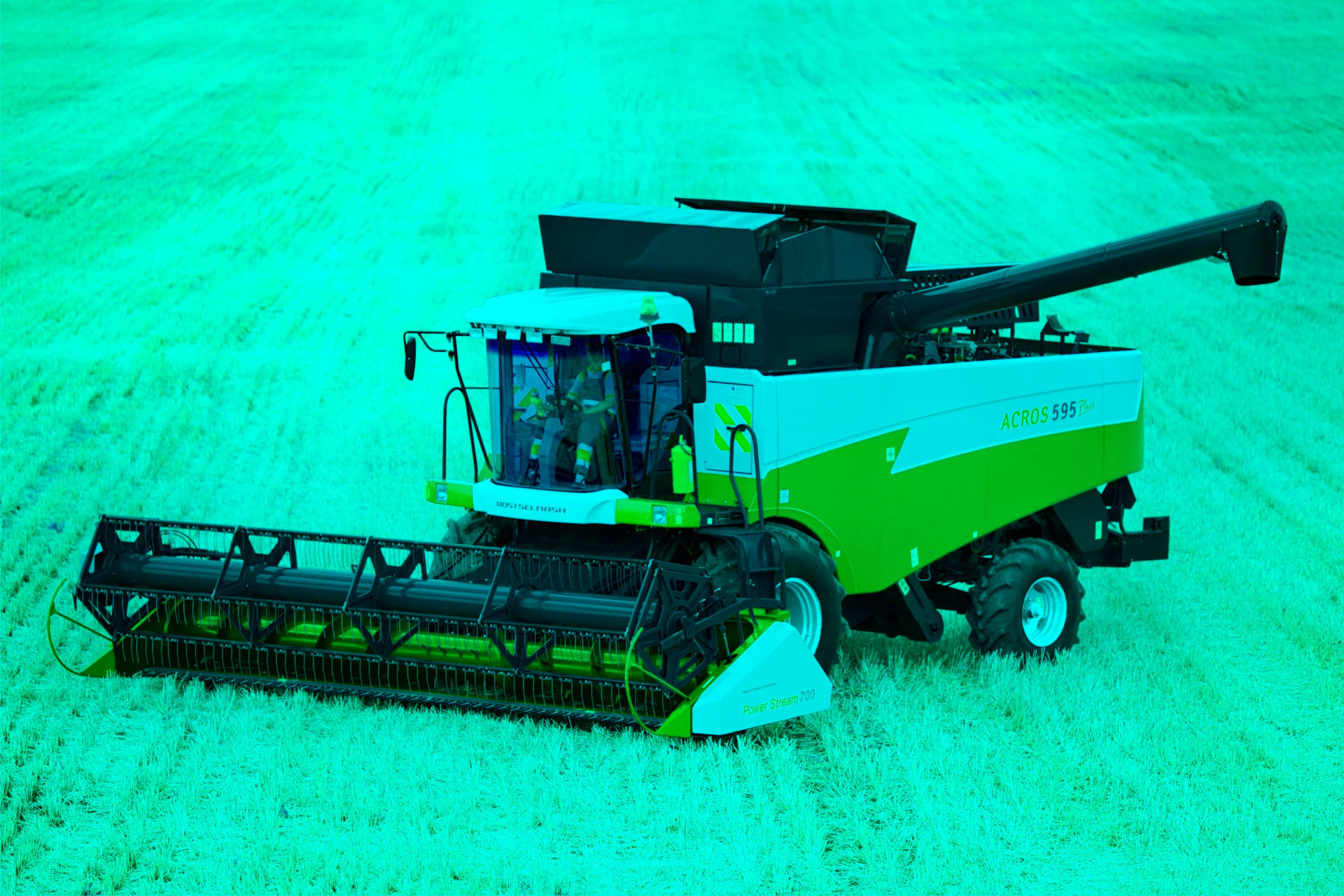 rostselmash-acros-595-harvester.jpg Зерноуборочный комбайн Ростсельмаш Акрос 595 убирает пшеницу в поле